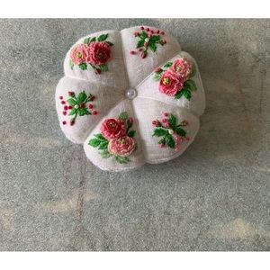Hand made, hand embroidered pin cushion.